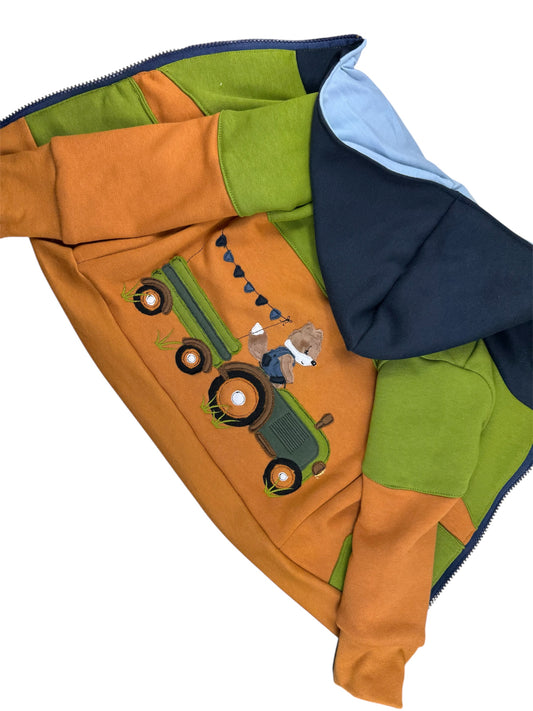 Kinderjacke mit Stickerei auf dem Rücken 