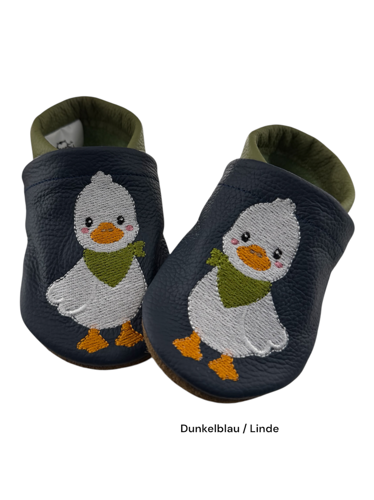     Dunkelblaue Lederpuschen mit niedlicher Entengans und lindgrünem Bündchen für Babys und Kleinkinder